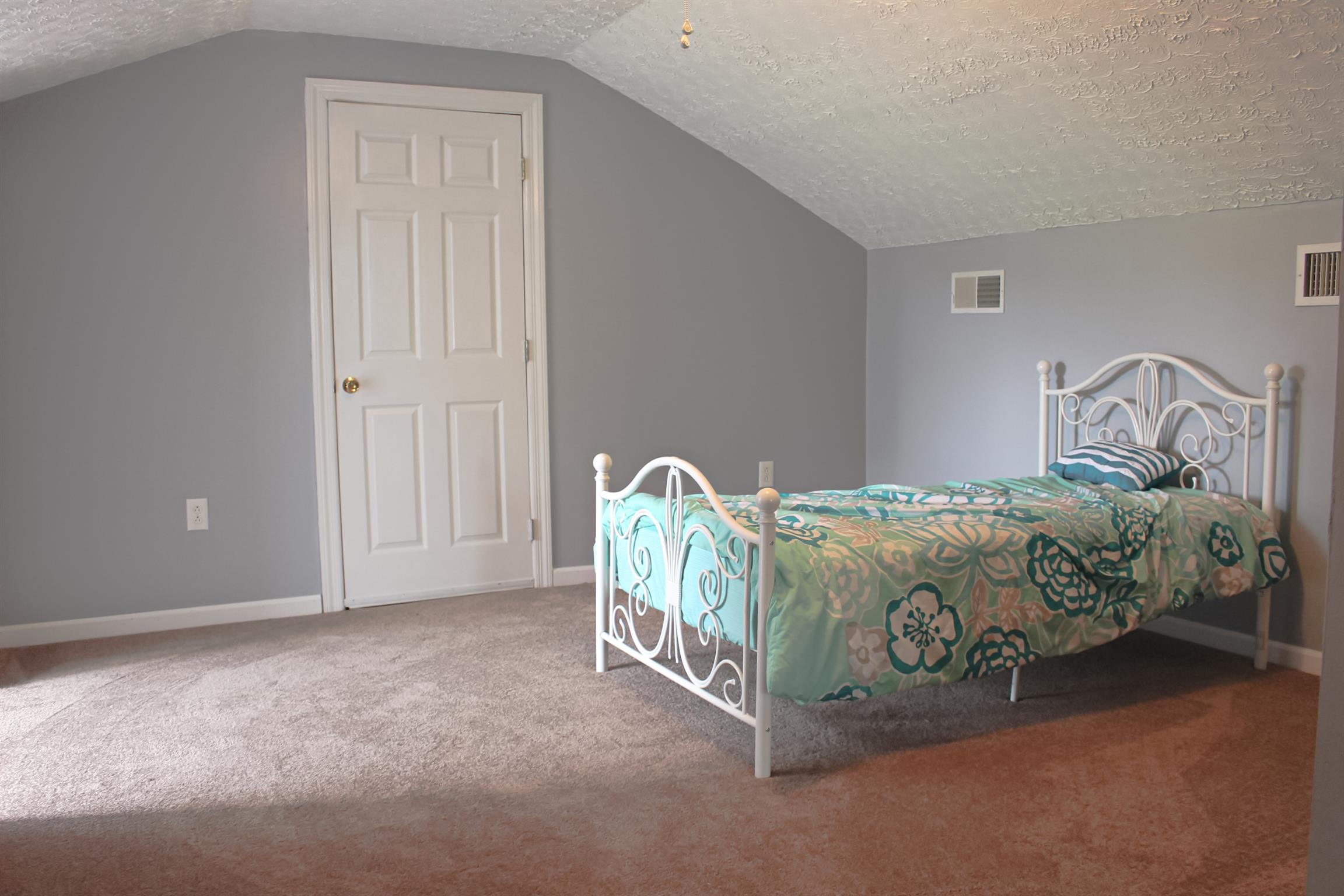 2454 Goshen Road Lebanon, TN 37087 - Photo 13 of 18 a bedroom with a bed and a window