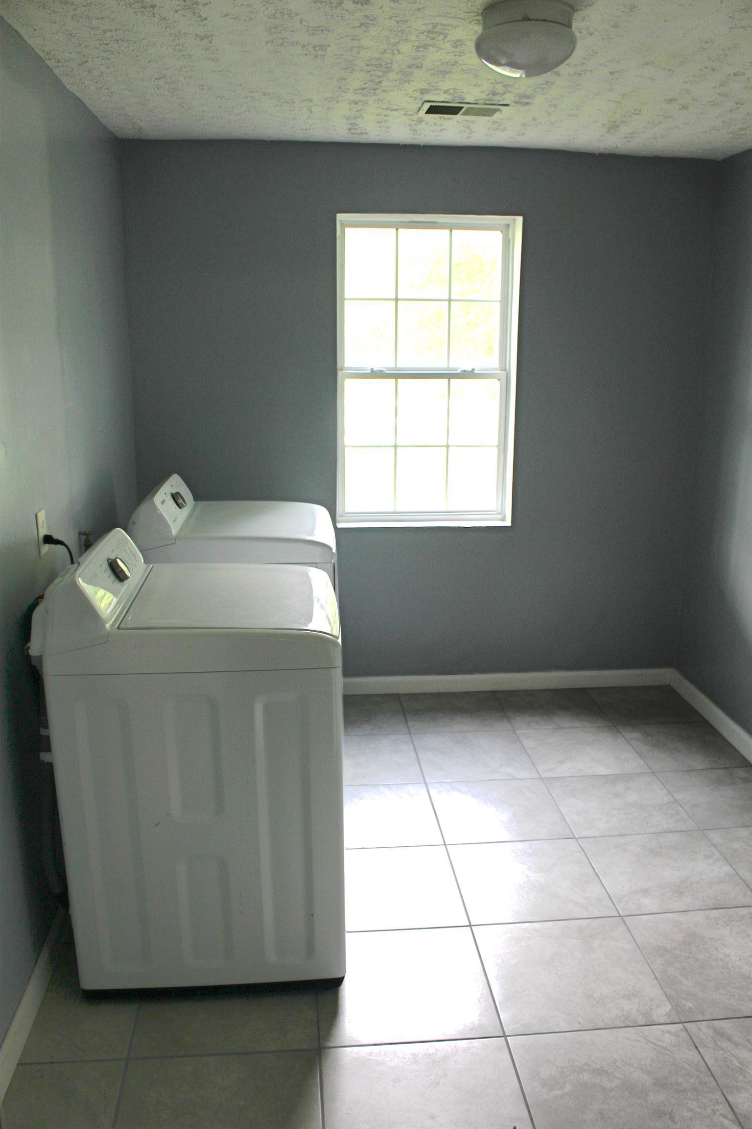 2454 Goshen Road Lebanon, TN 37087 - Photo 6 of 18 a utility room with washer and dryer