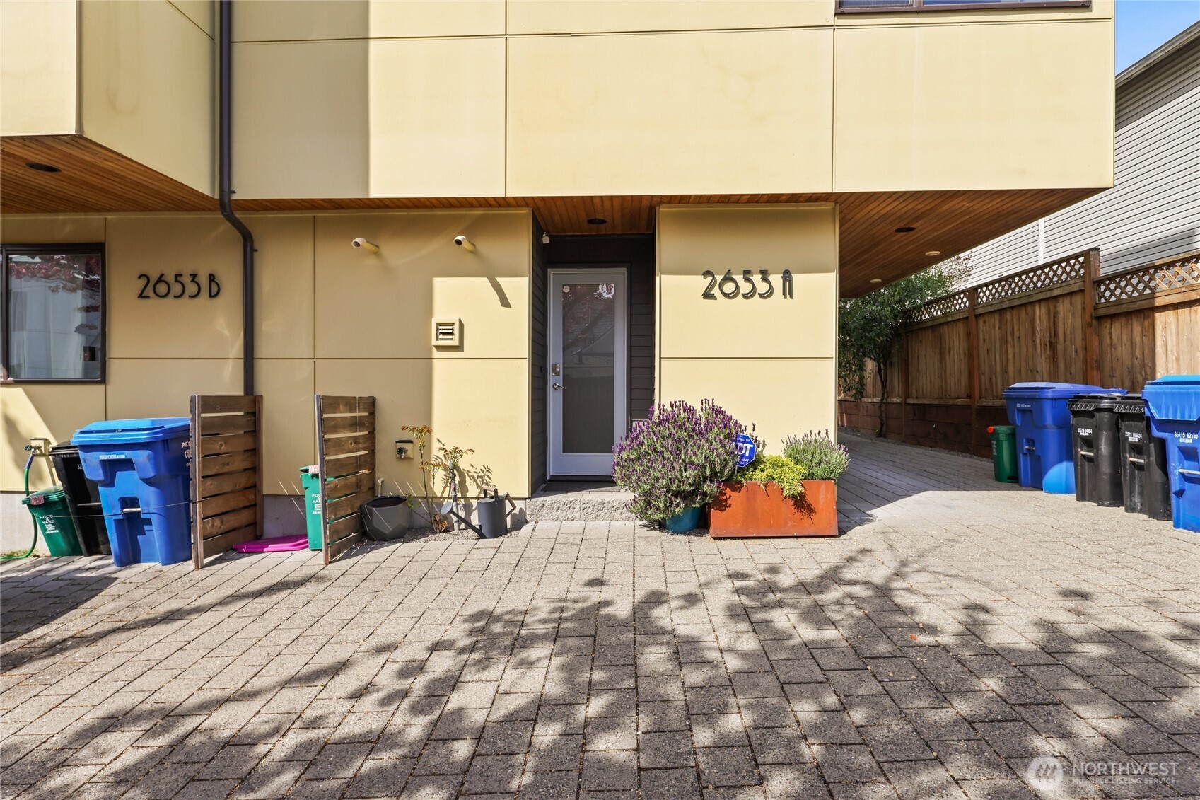 2653 Northwest 64th Street, Unit A Seattle, WA 98107 - Photo 25 of 32 a view of a chairs with a outdoor space