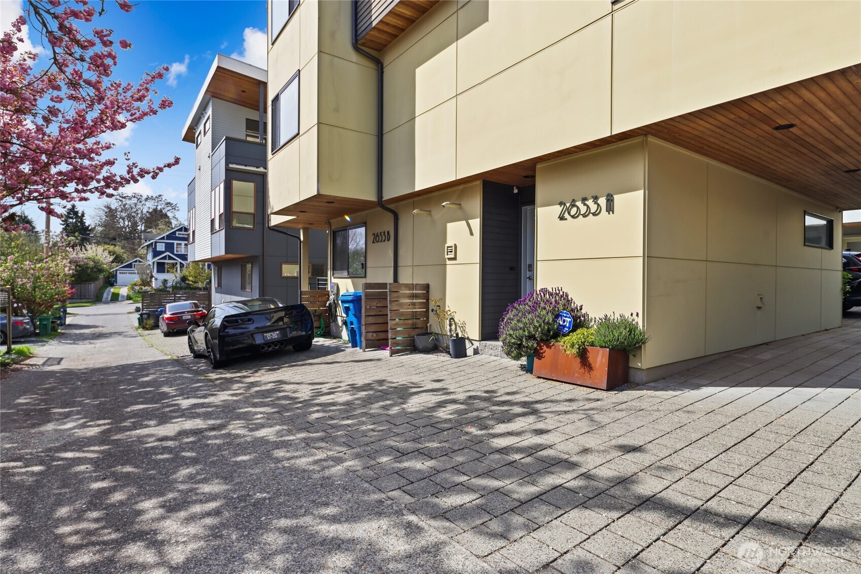 2653 Northwest 64th Street, Unit A Seattle, WA 98107 - Photo 26 of 32 a view of a street with cars