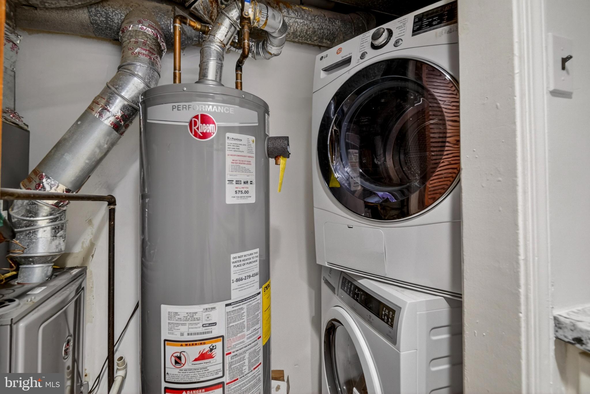 1351 Monroe Street Northwest Washington, DC 20010 - Photo 11 of 23 a utility room with dryer and washer