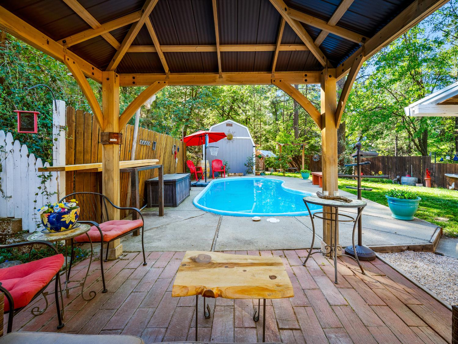 6800 Diablo View Trail Placerville, CA 95667 - Photo 11 of 33 a backyard of a house with table and chairs