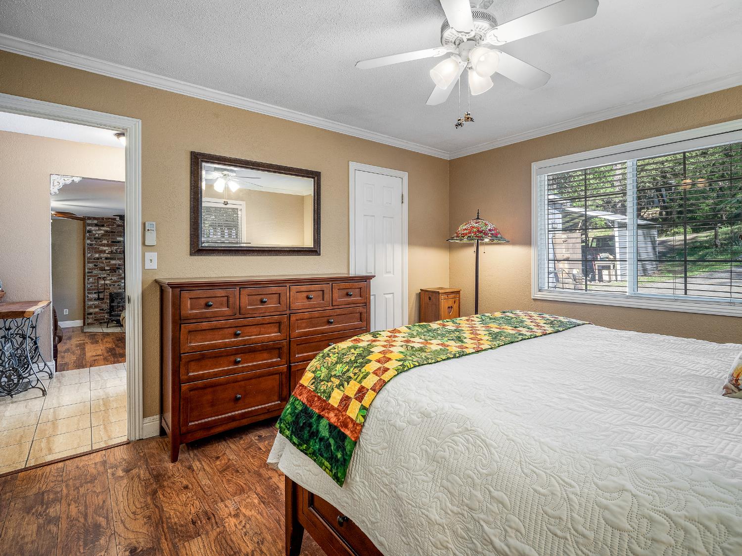 6800 Diablo View Trail Placerville, CA 95667 - Photo 20 of 33 a bedroom with a bed and a chandelier