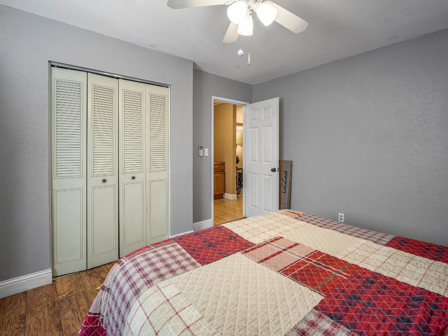 6800 Diablo View Trail Placerville, CA 95667 - Photo 23 of 33 a bedroom with a large bed and a chandelier