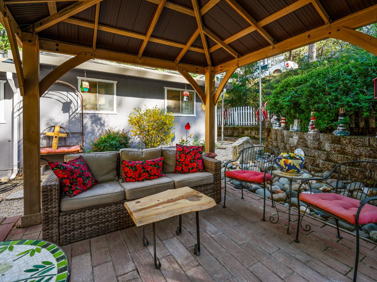 6800 Diablo View Trail Placerville, CA 95667 - Photo 10 of 33 a outdoor space with patio the couches and a dining table with the view of garden