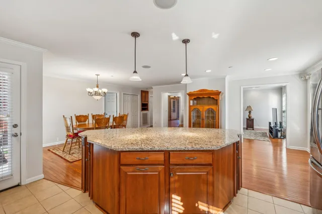 a kitchen with stainless steel appliances granite countertop a sink and counter space