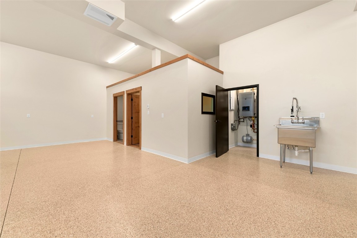 1716 Copper Ridge Spur, Unit 1 Steamboat Springs, CO 80487 - Photo 22 of 27 Garage-office, bathroom and slop sink