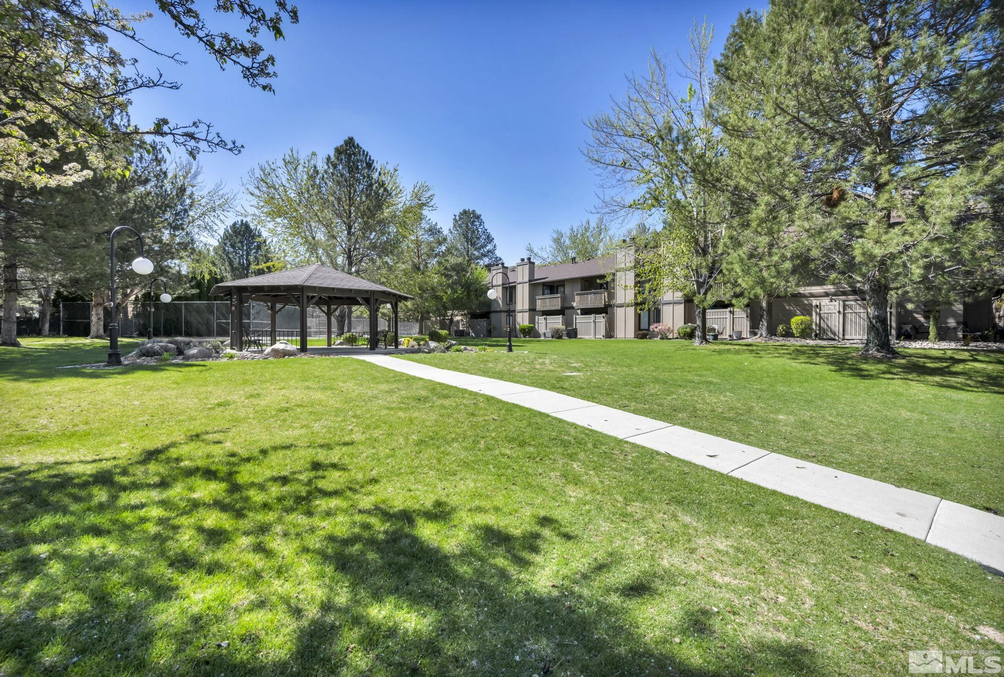 4721 Reggie Road Reno, NV 89502 - Photo 24 of 33 a view of a house with a big yard