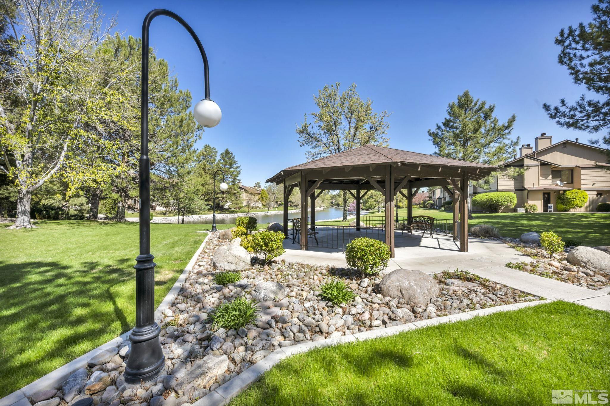 4721 Reggie Road Reno, NV 89502 - Photo 26 of 33 a view of a house with backyard and sitting area