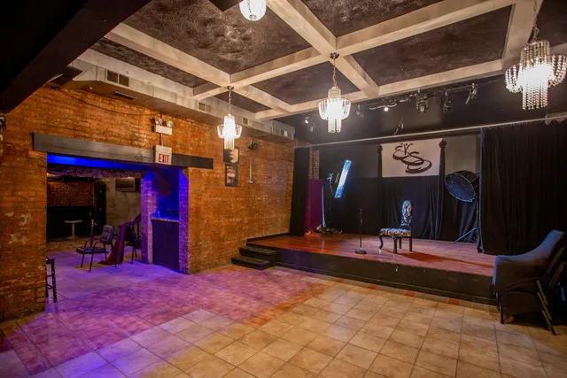 a outdoor space with lots of chairs and mirrors