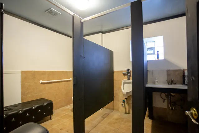 a bathroom with a mirror