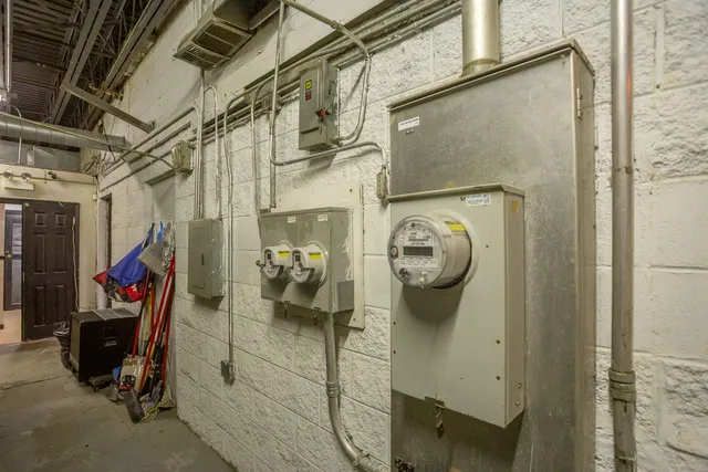 an aerial view of a house with a yard basket ball court and outdoor seating