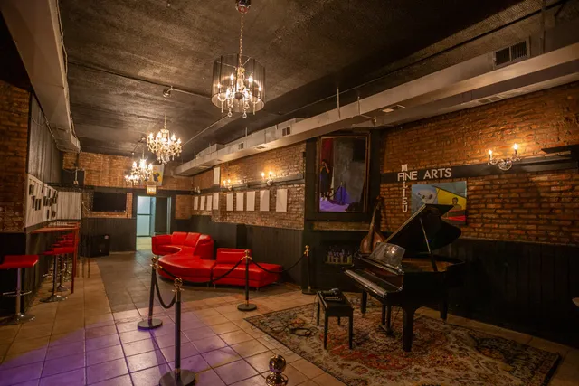 a view of swimming pool with seating space