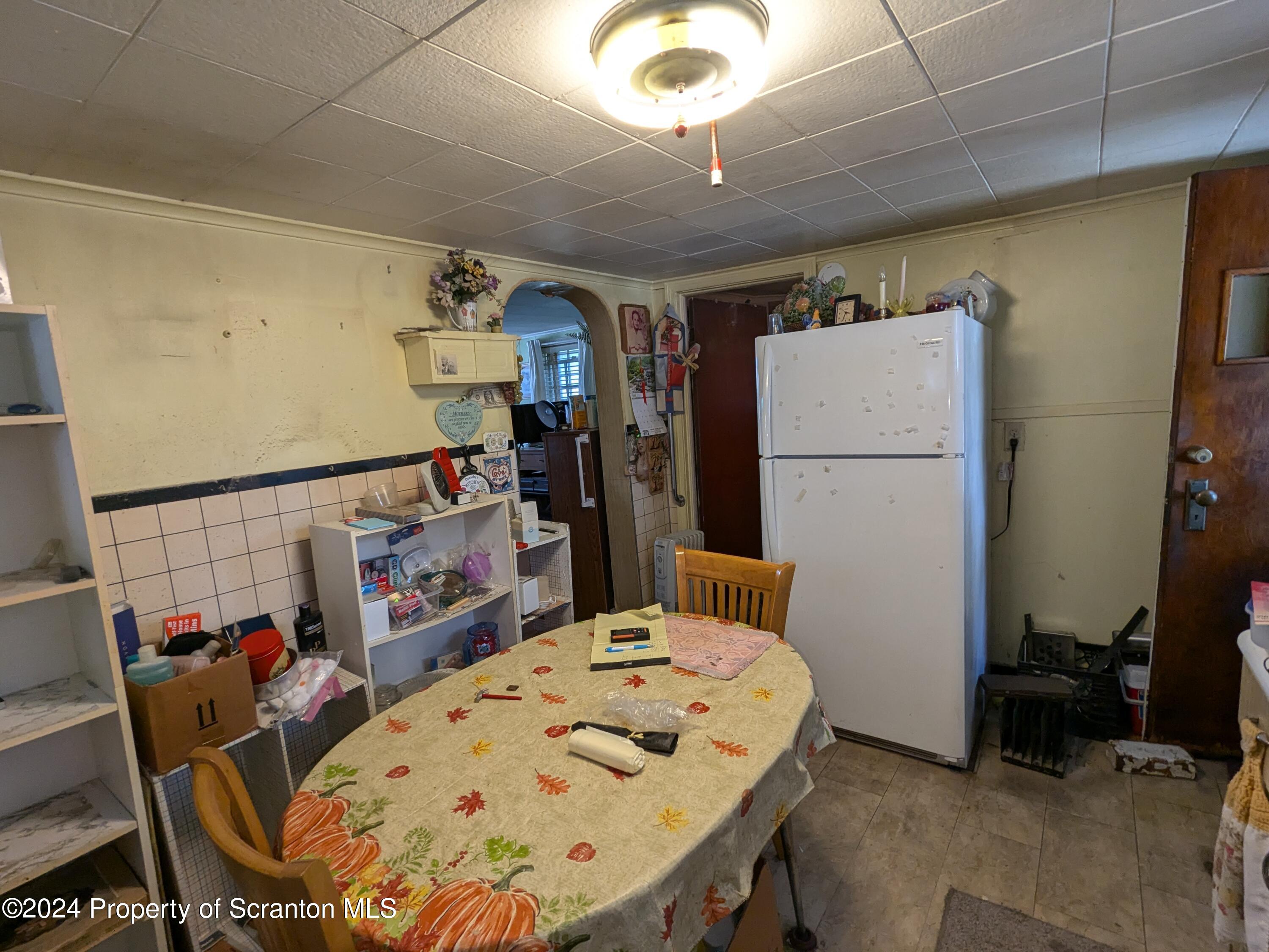 909 Battle Street Scranton, PA 18508 - Photo 5 of 11 a view of a dining room with furniture