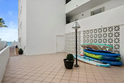 a view of swimming pool with a lounge chair