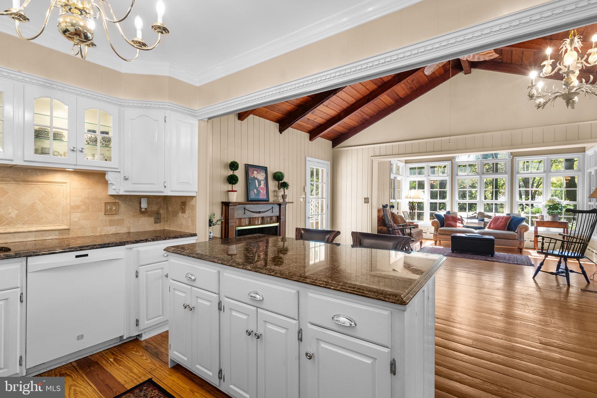 801 Notley Road Silver Spring, MD 20904 - Photo 13 of 42 a kitchen with sink cabinets and living room