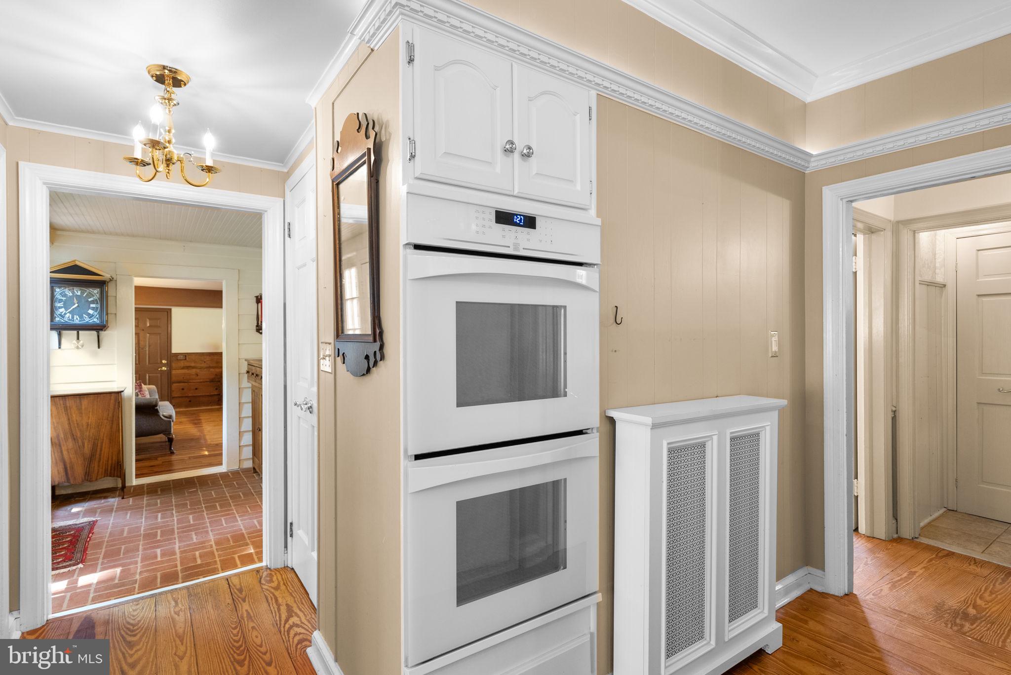 801 Notley Road Silver Spring, MD 20904 - Photo 17 of 42 a kitchen with stainless steel appliances granite countertop a refrigerator and a stove
