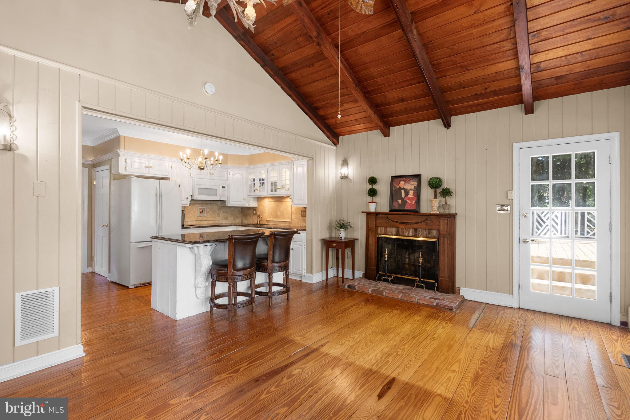801 Notley Road Silver Spring, MD 20904 - Photo 18 of 42 a living room with furniture and a fireplace