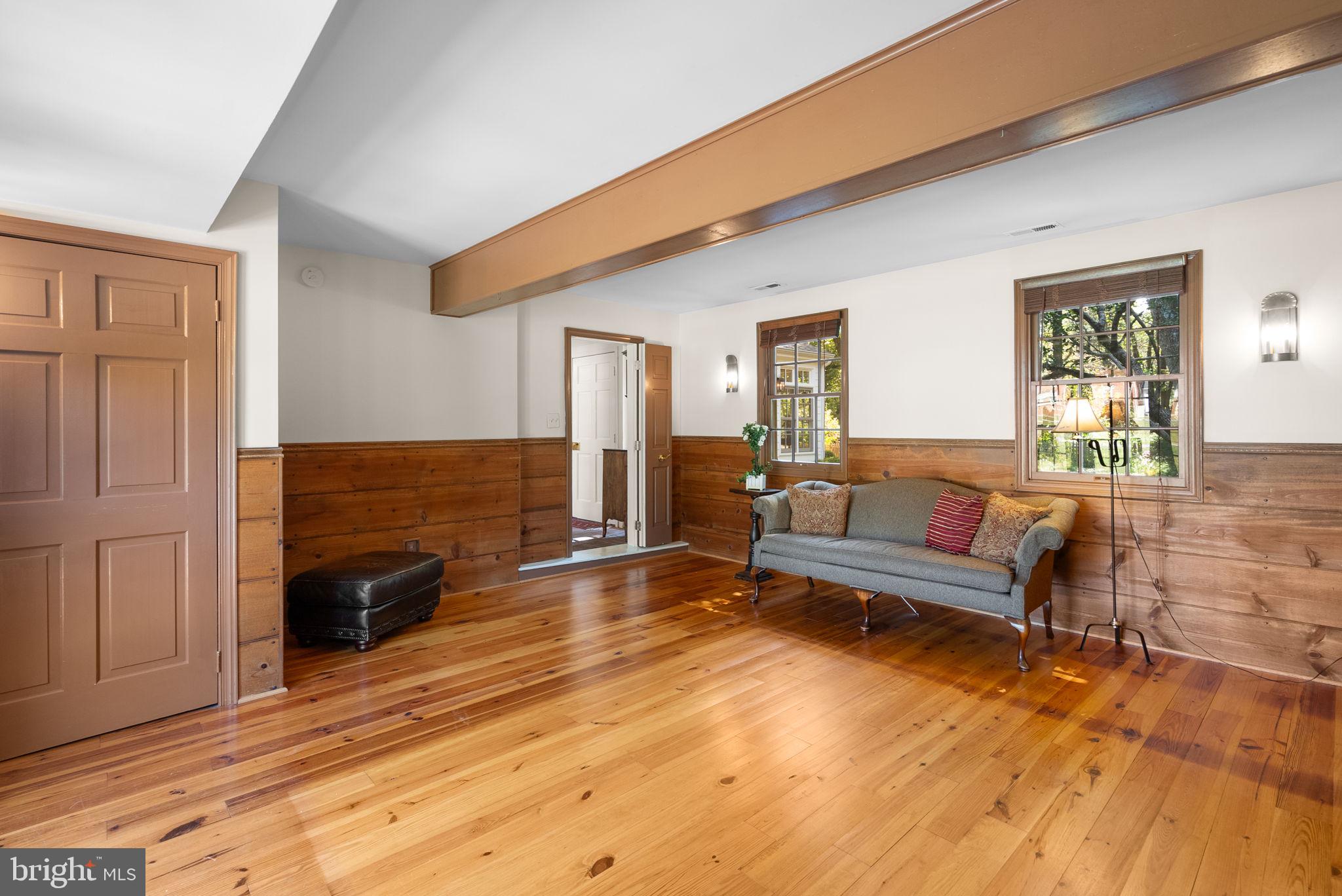 801 Notley Road Silver Spring, MD 20904 - Photo 22 of 42 a living room with furniture and a wooden floor