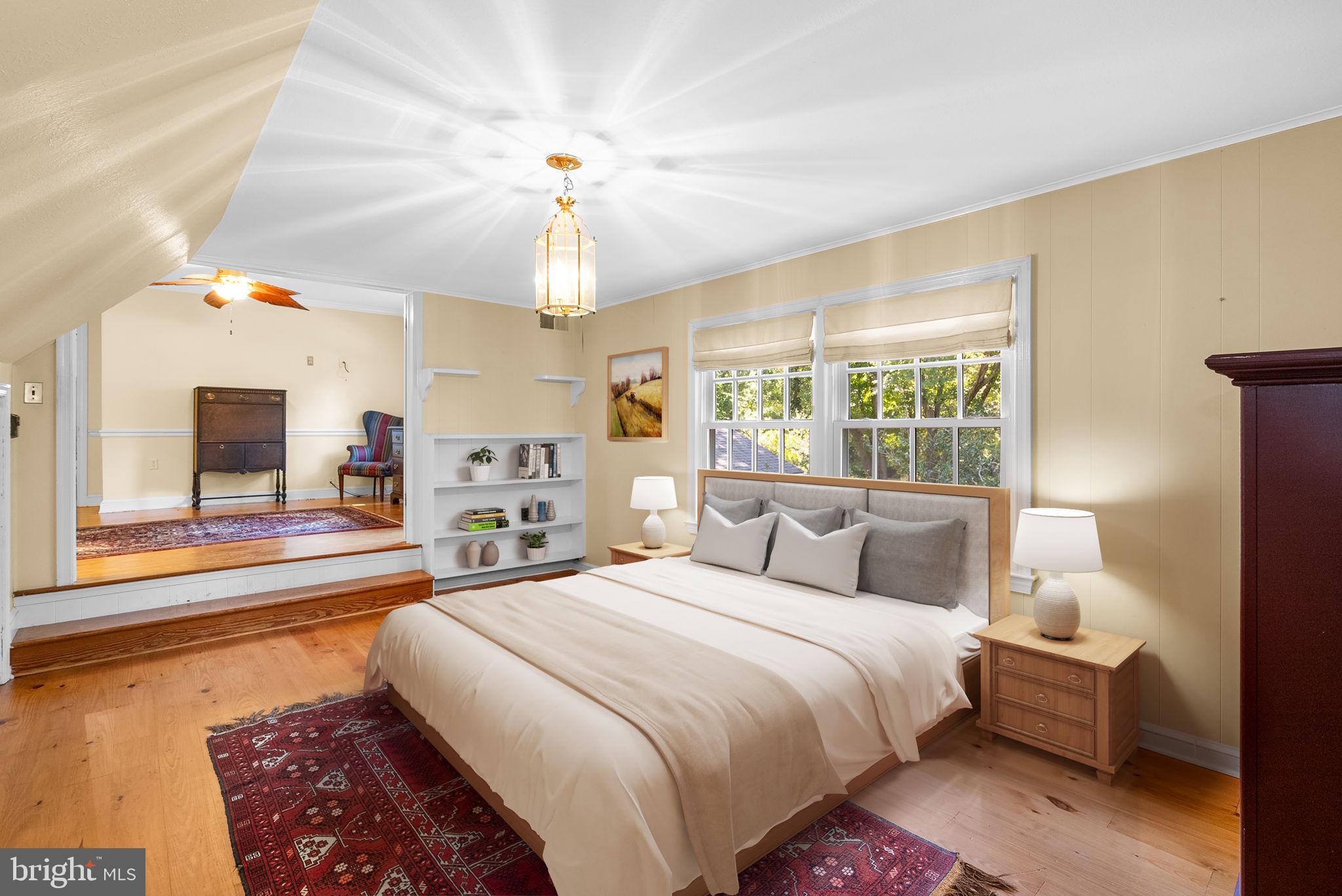 801 Notley Road Silver Spring, MD 20904 - Photo 26 of 42 a bedroom with a bed and a chandelier