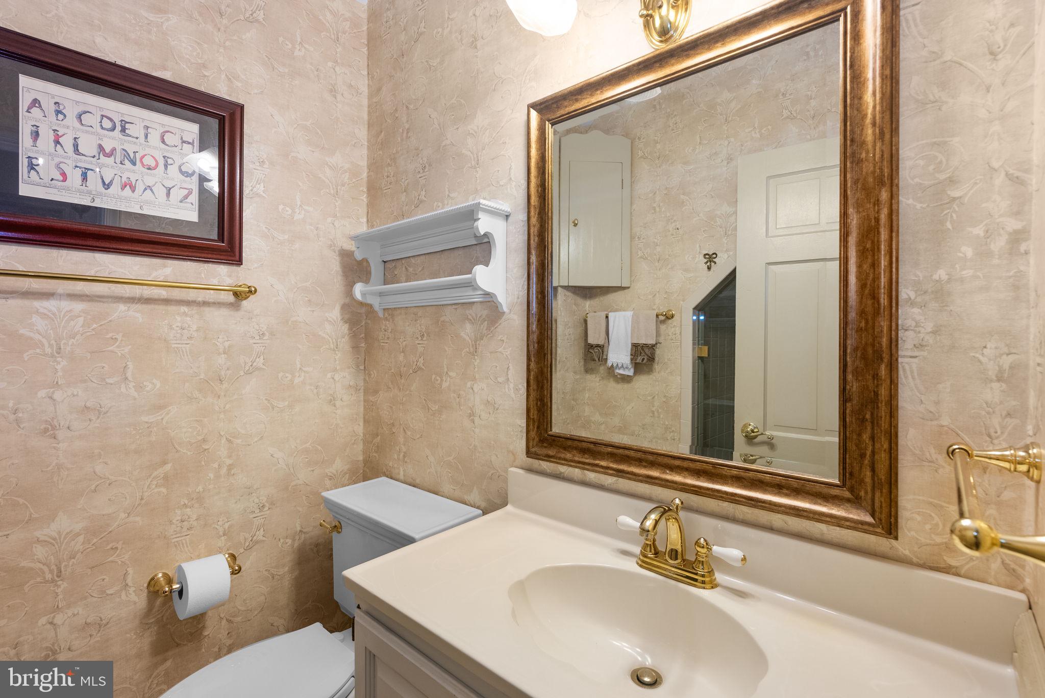 801 Notley Road Silver Spring, MD 20904 - Photo 28 of 42 a bathroom with a sink and a mirror