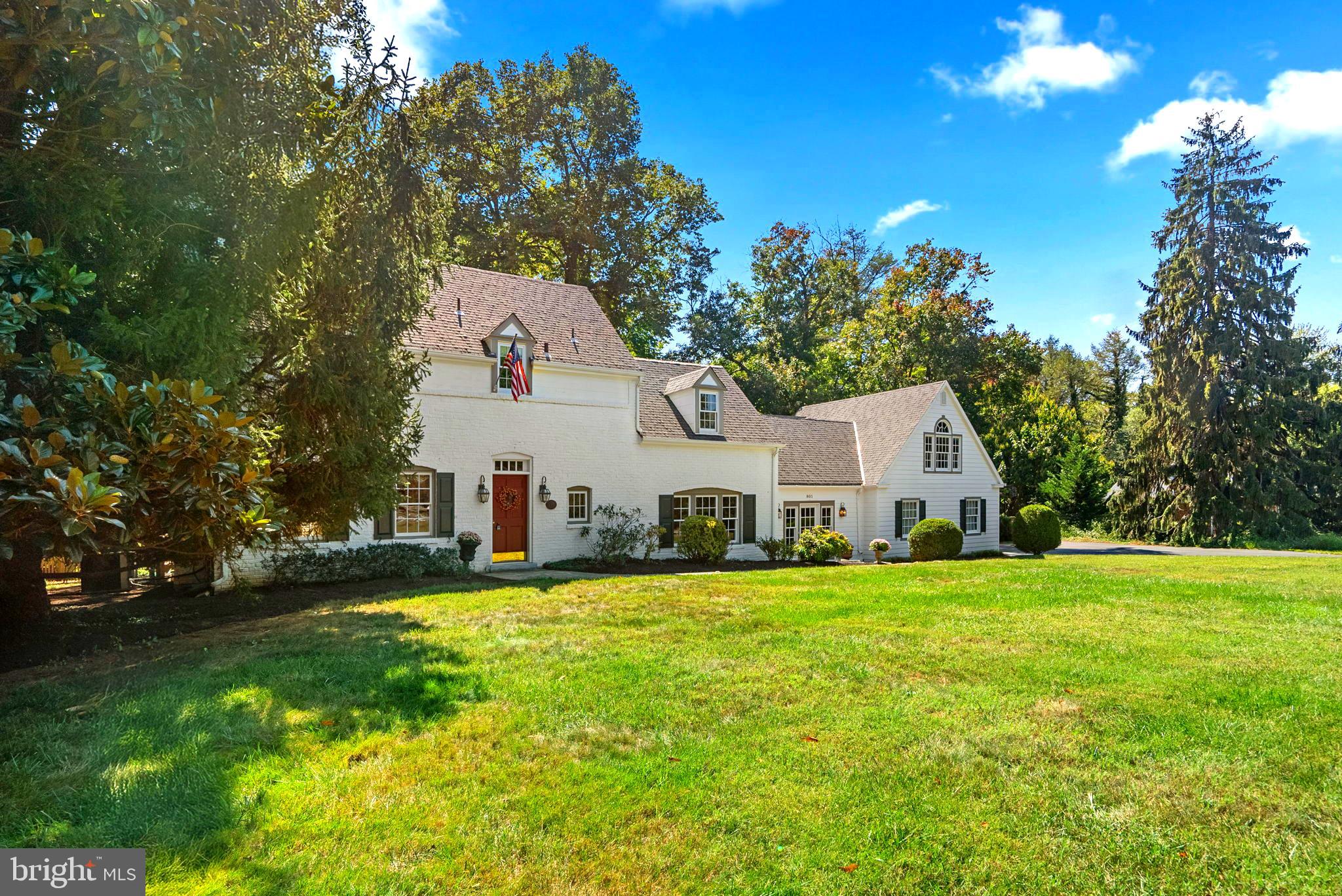 801 Notley Road Silver Spring, MD 20904 - Photo 3 of 42 a front view of a house with a yard and garage