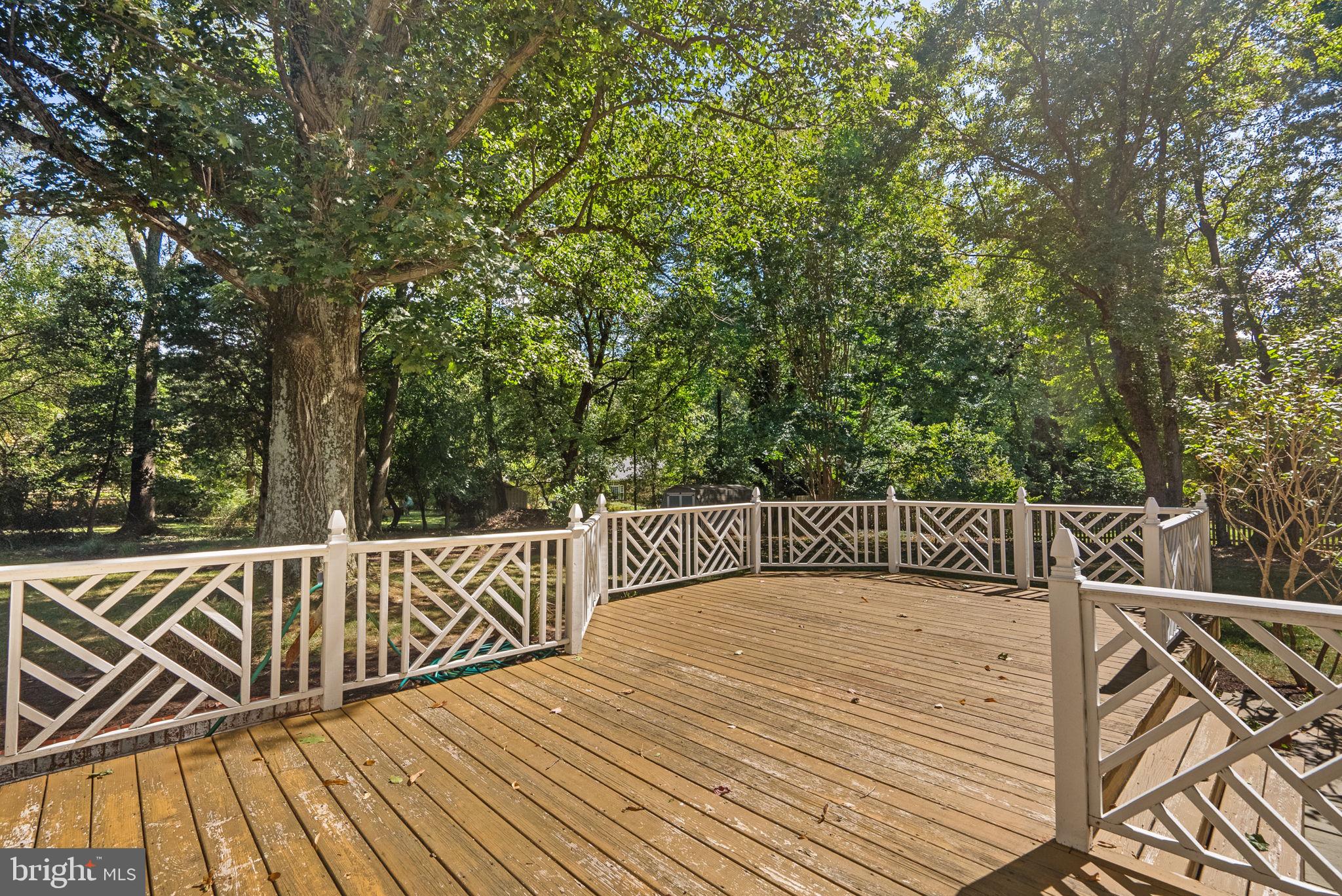 801 Notley Road Silver Spring, MD 20904 - Photo 41 of 42 a view of balcony with wooden floor and fence