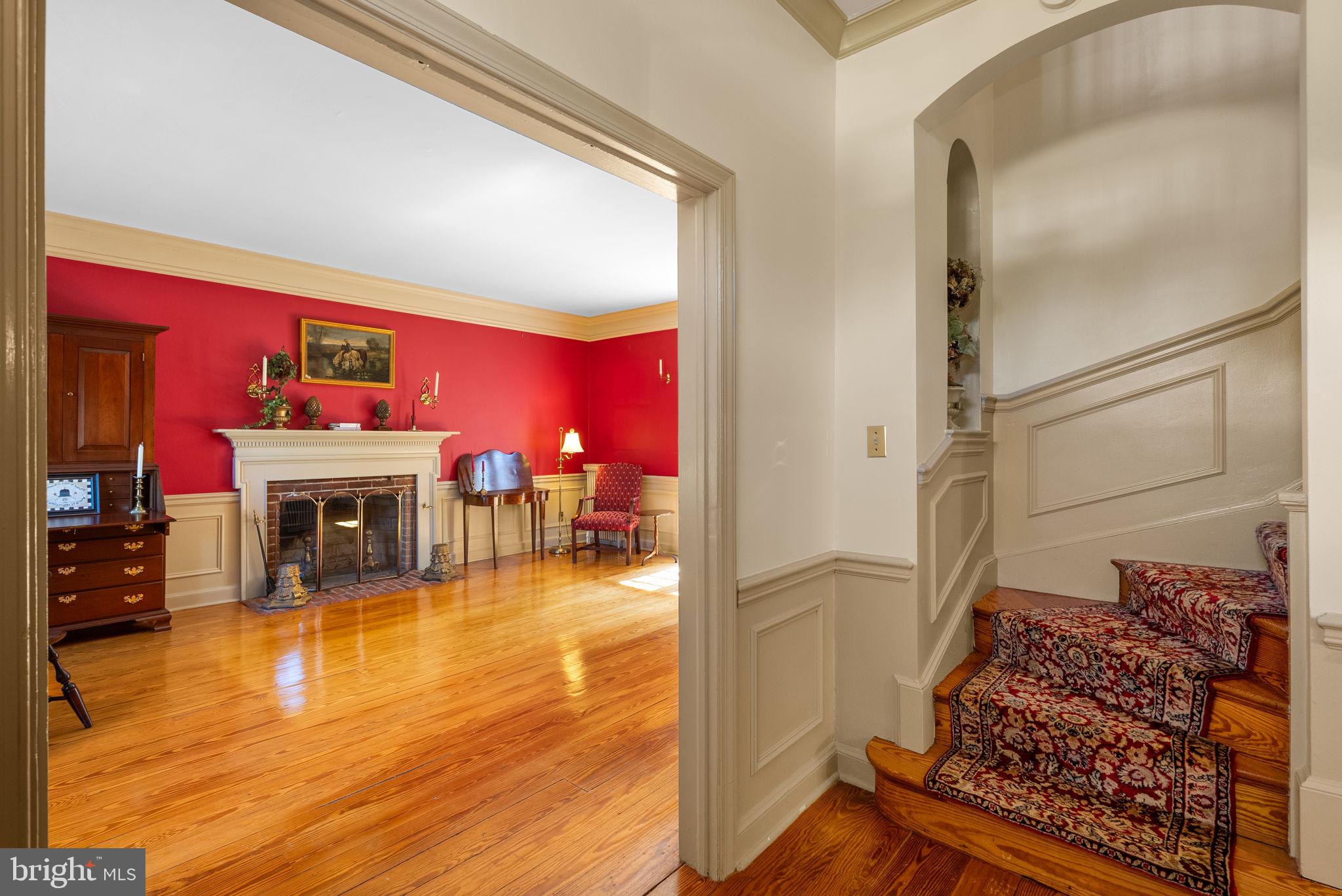 801 Notley Road Silver Spring, MD 20904 - Photo 6 of 42 a living room with furniture and a fireplace