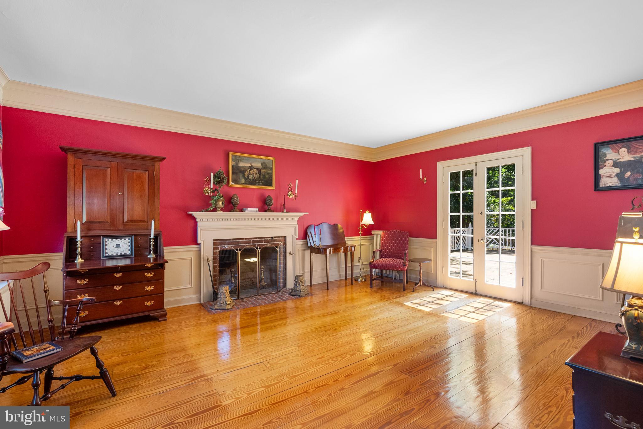 801 Notley Road Silver Spring, MD 20904 - Photo 7 of 42 a living room with furniture and a fireplace