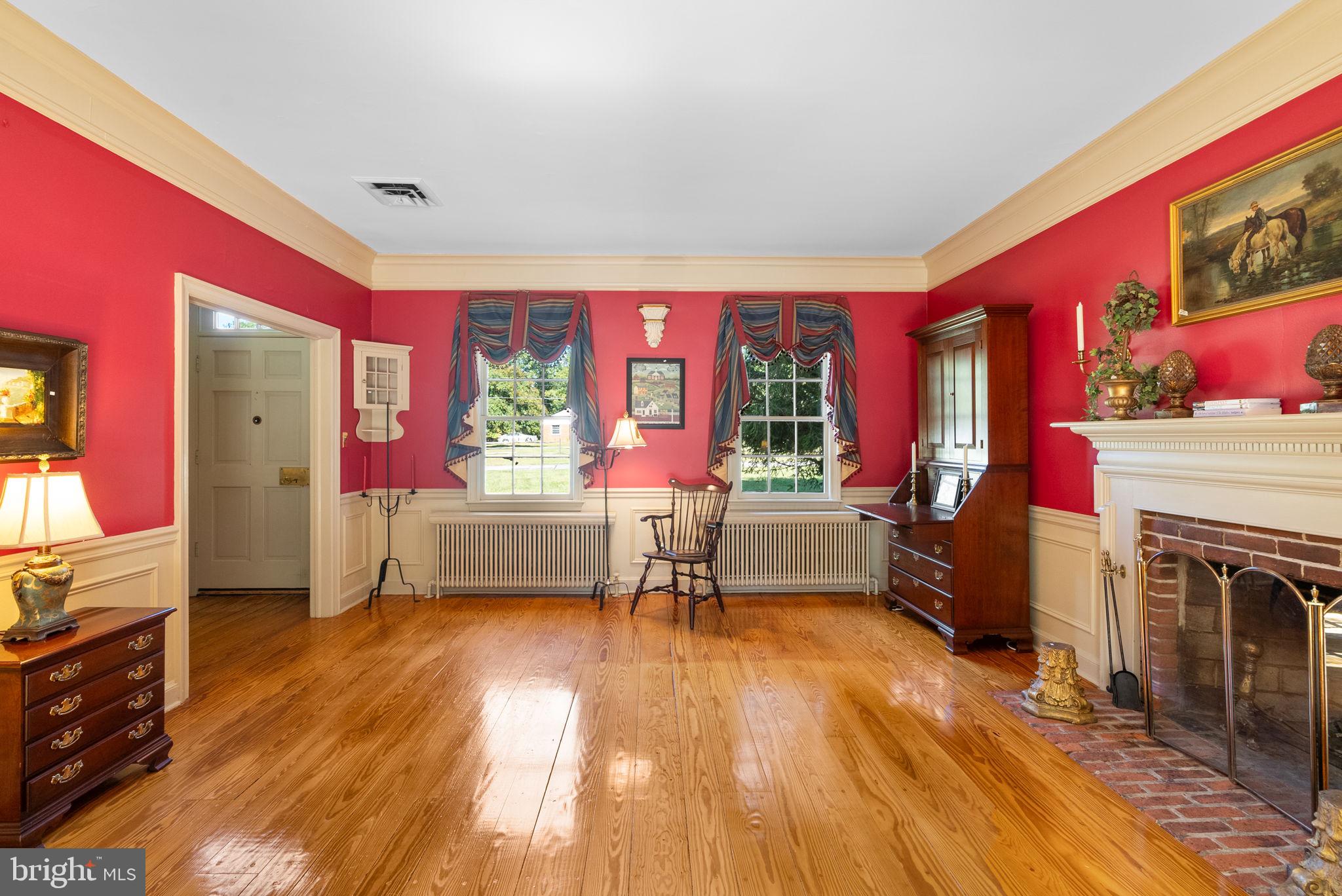 801 Notley Road Silver Spring, MD 20904 - Photo 9 of 42 a living room with furniture and a fireplace
