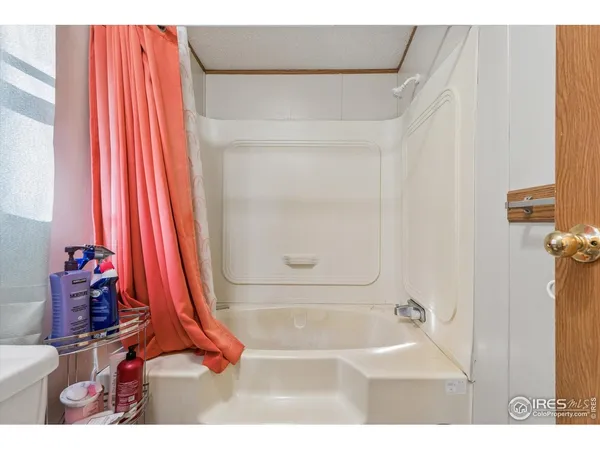 a bathroom with a sink and a bath tub