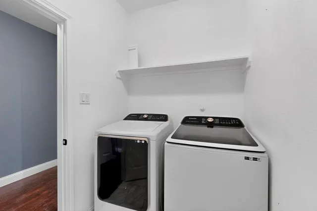 a utility room with dryer and washer