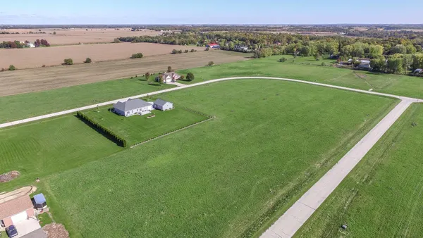 a view of a garden with an outdoor space