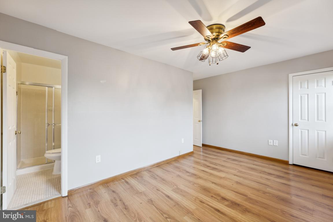 7448 Pohick Road Lorton, VA 22079 - Photo 20 of 25 Primary with ceiling fan