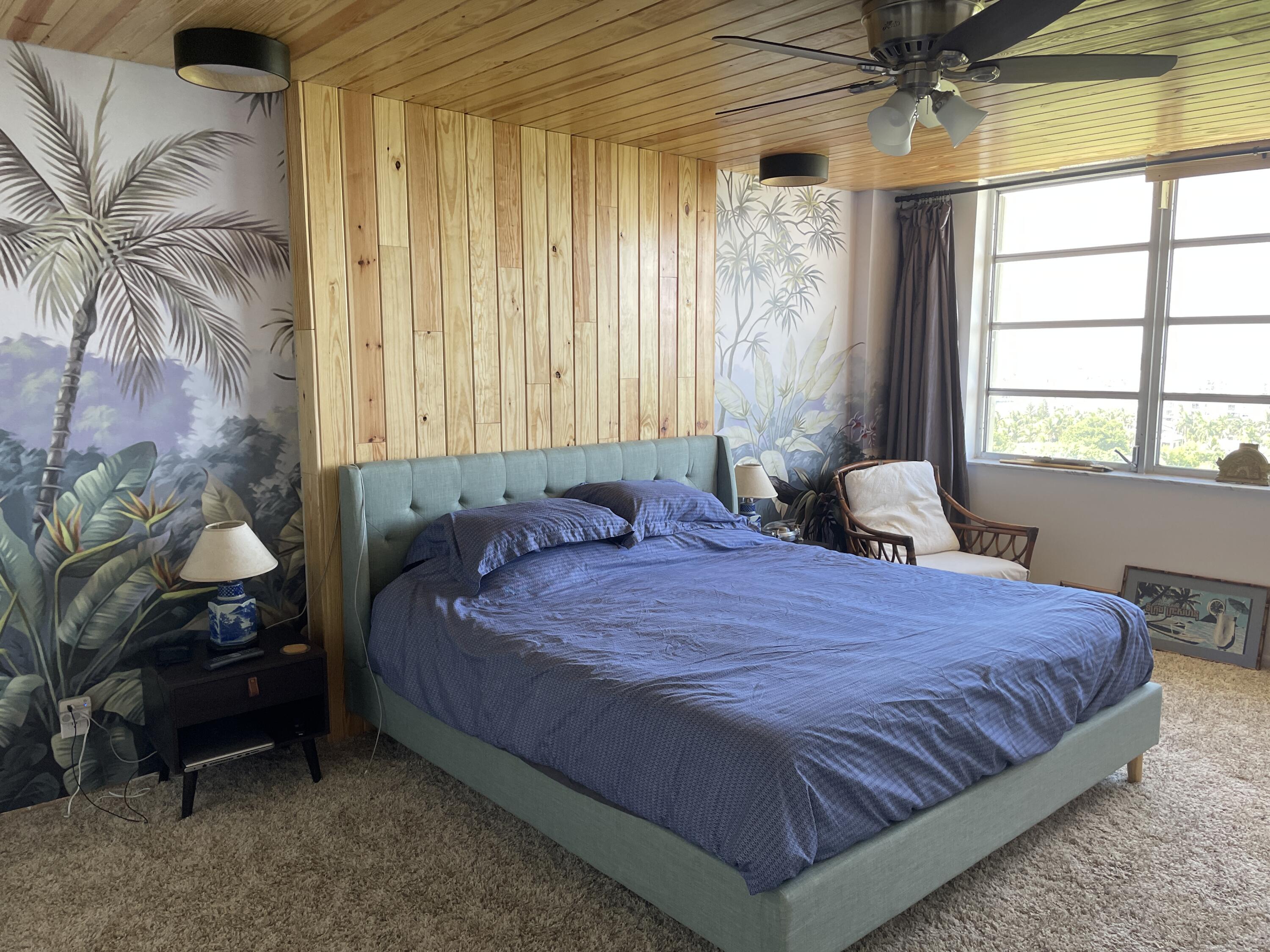 2121 North Ocean Boulevard, Unit 1204E Boca Raton, FL 33431 - Photo 12 of 21 a bedroom with a bed and a window