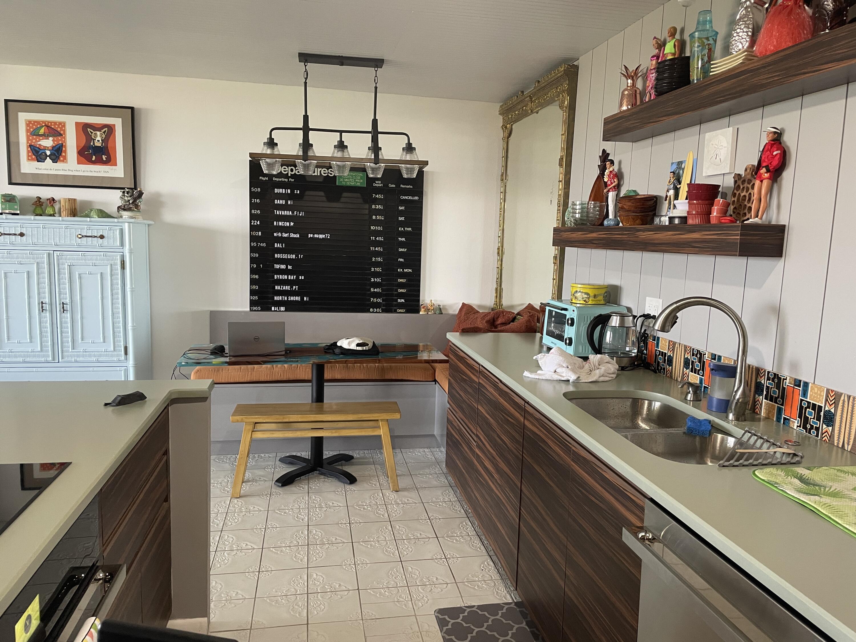 2121 North Ocean Boulevard, Unit 1204E Boca Raton, FL 33431 - Photo 6 of 21 a kitchen with a sink and cabinets