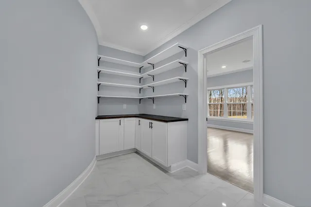 a view of an empty walk in closet