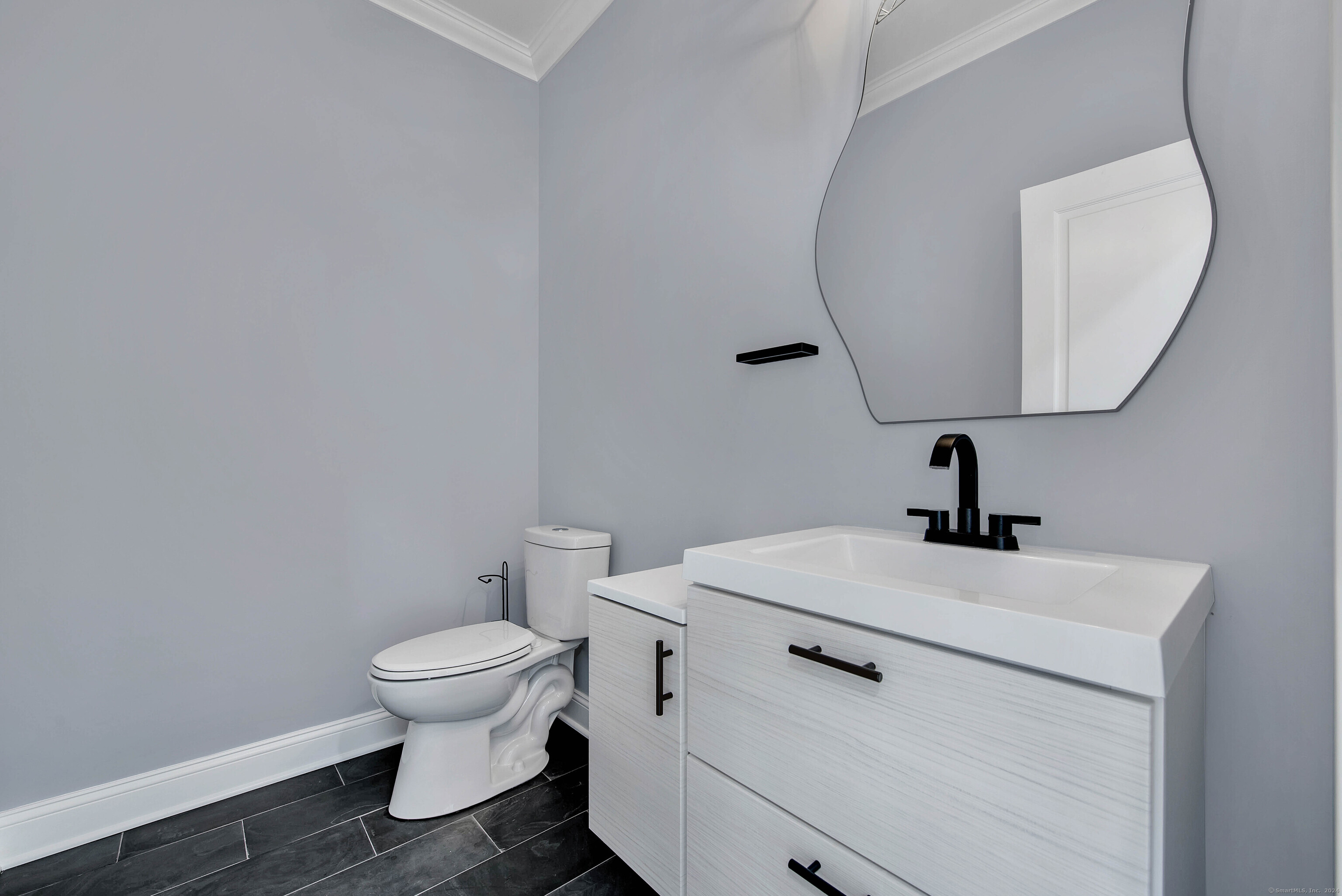 34 Fox Run Road Redding, CT 06896 - Photo 18 of 40 a bathroom with a sink toilet and a mirror