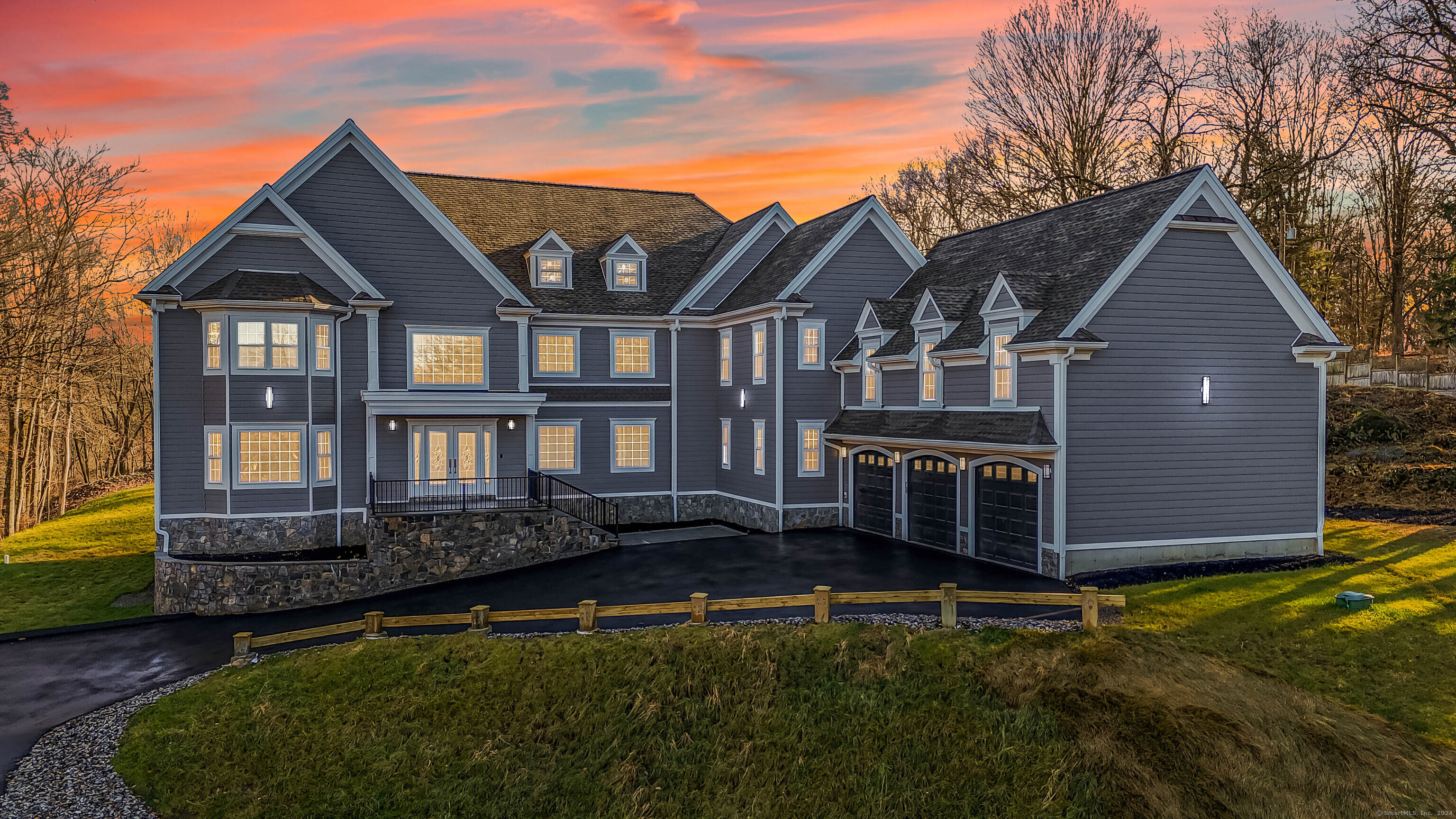 34 Fox Run Road Redding, CT 06896 - Photo 2 of 40 a front view of a house with a yard and potted plants
