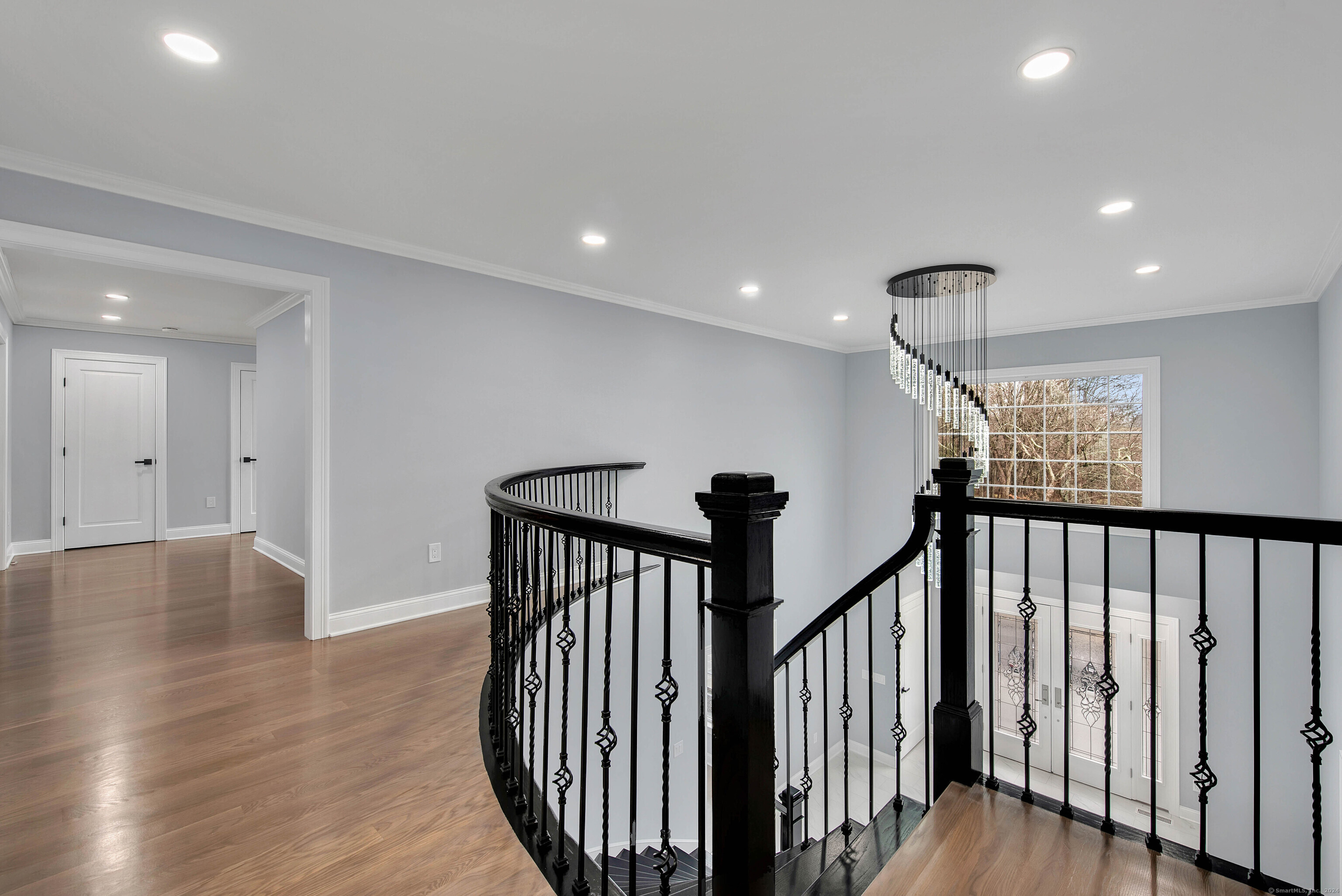 34 Fox Run Road Redding, CT 06896 - Photo 25 of 40 a view of a hallway with wooden floor and stairs