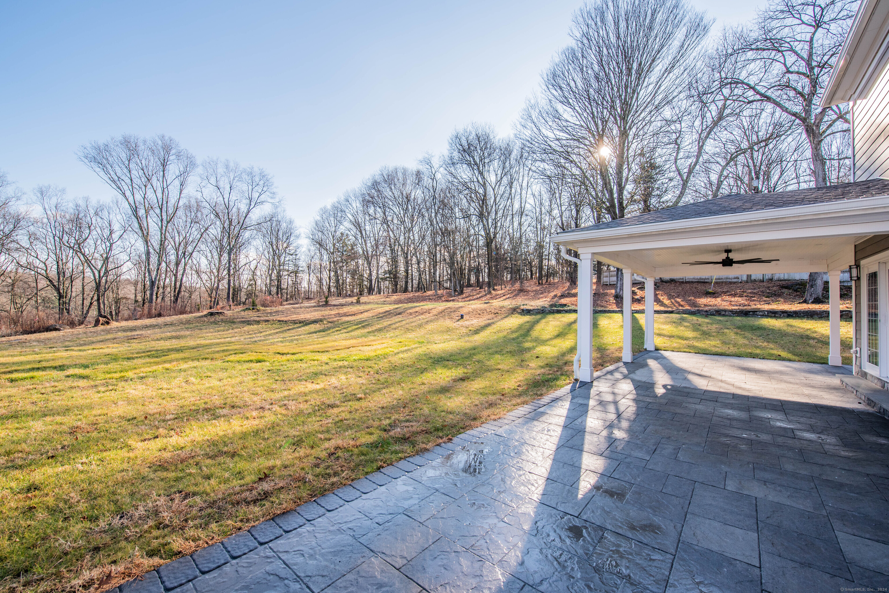 34 Fox Run Road Redding, CT 06896 - Photo 39 of 40 a view of a swimming pool with a lounge chairs