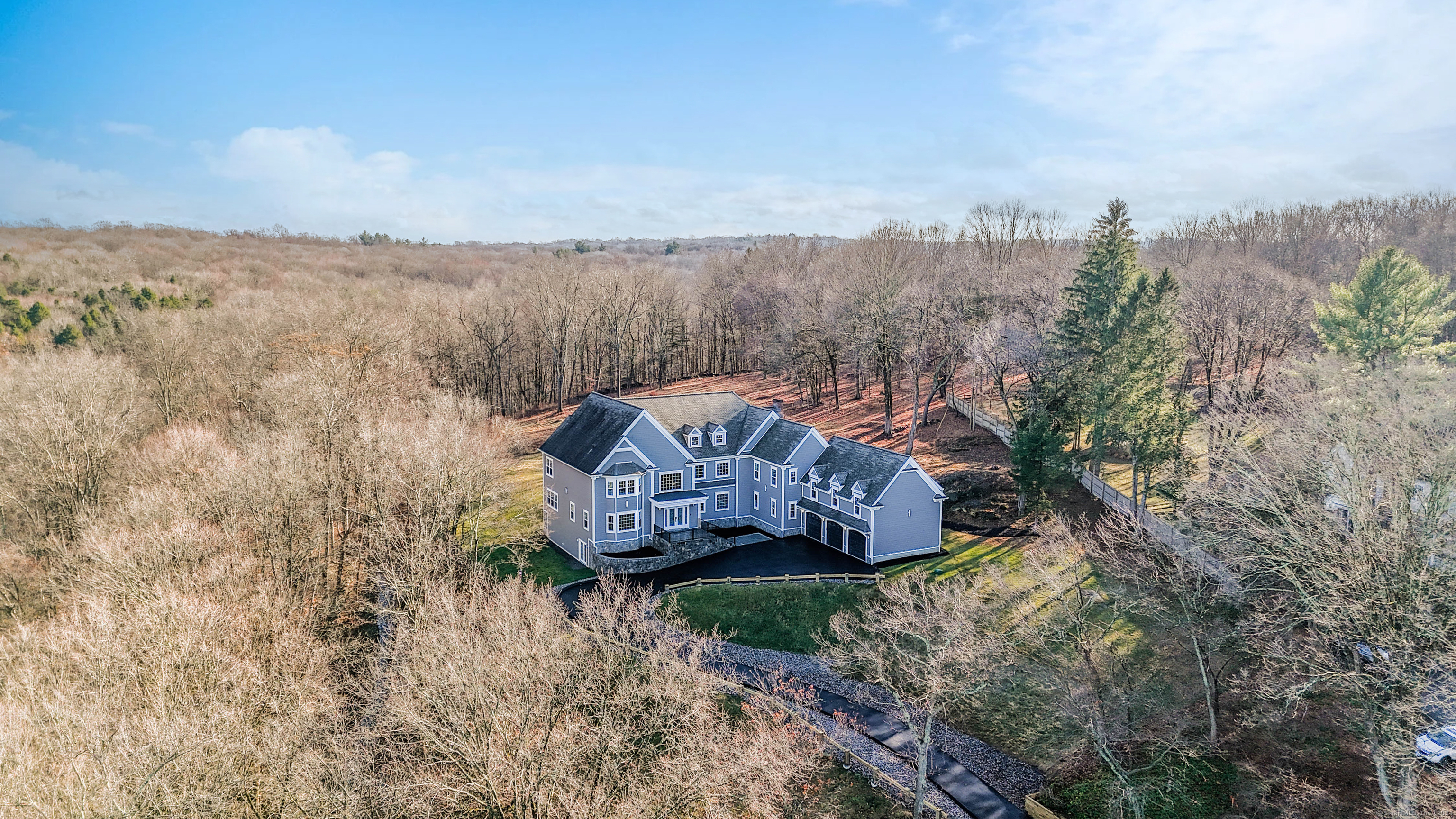 34 Fox Run Road Redding, CT 06896 - Photo 5 of 40 a view of a house with a yard