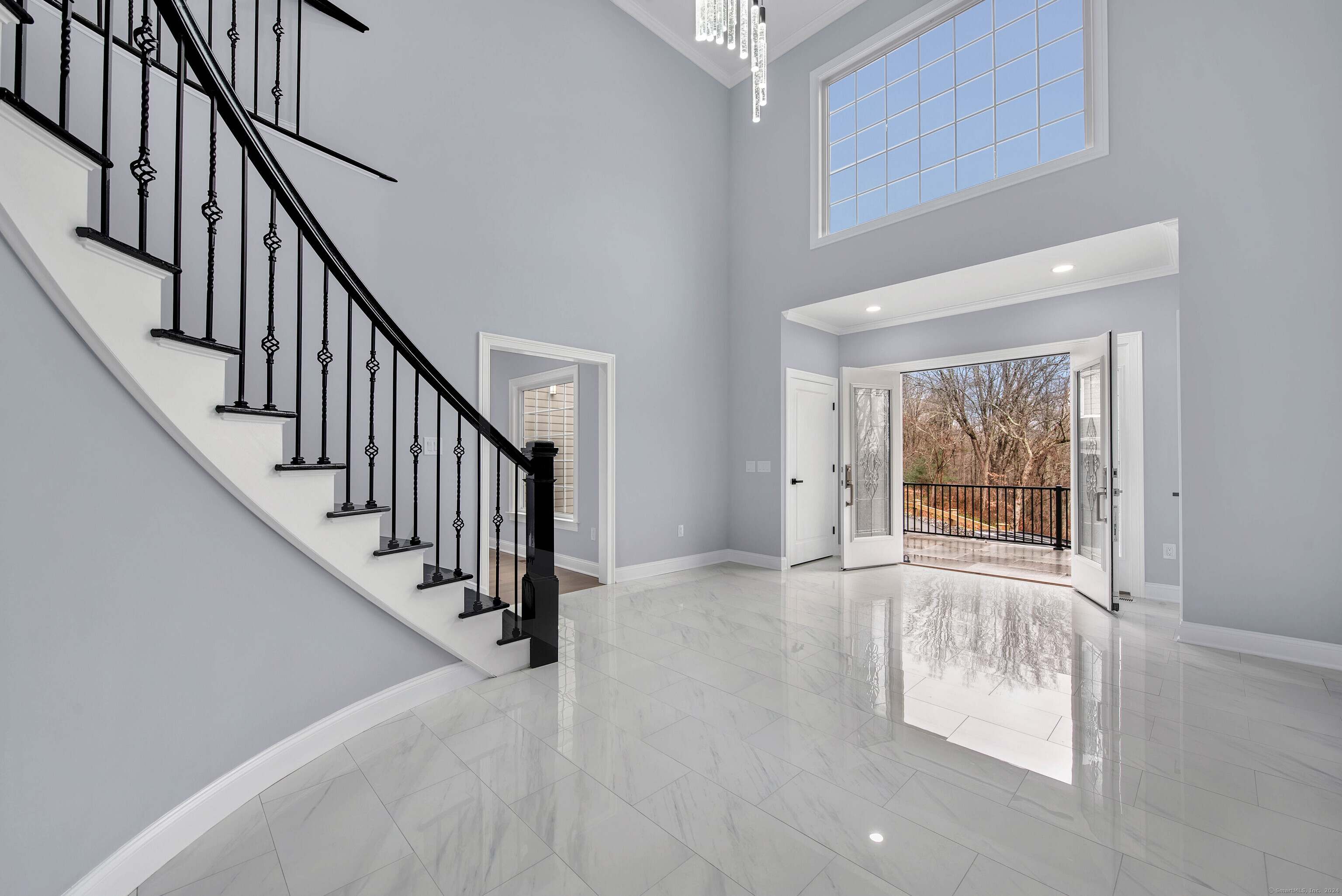 34 Fox Run Road Redding, CT 06896 - Photo 6 of 40 a view of an entryway with wooden floor