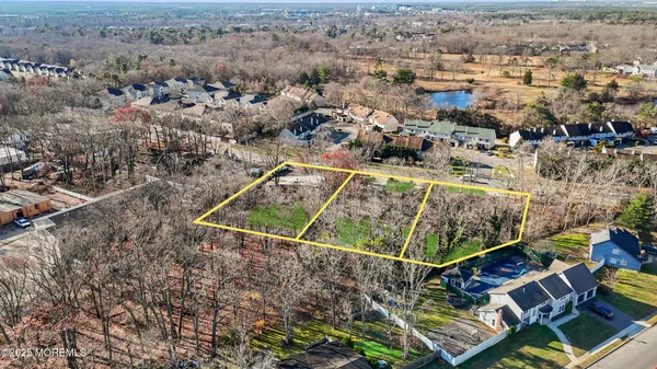 an aerial view of house with yard
