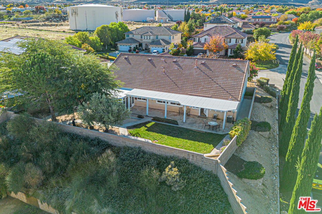 40918 Rise Court Palmdale, CA 93551 - Photo 45 of 45 a view of a house with a yard
