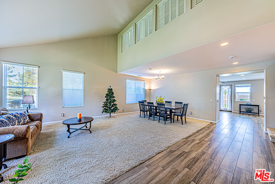 40918 Rise Court Palmdale, CA 93551 - Photo 7 of 45 a living room with furniture and wooden floor