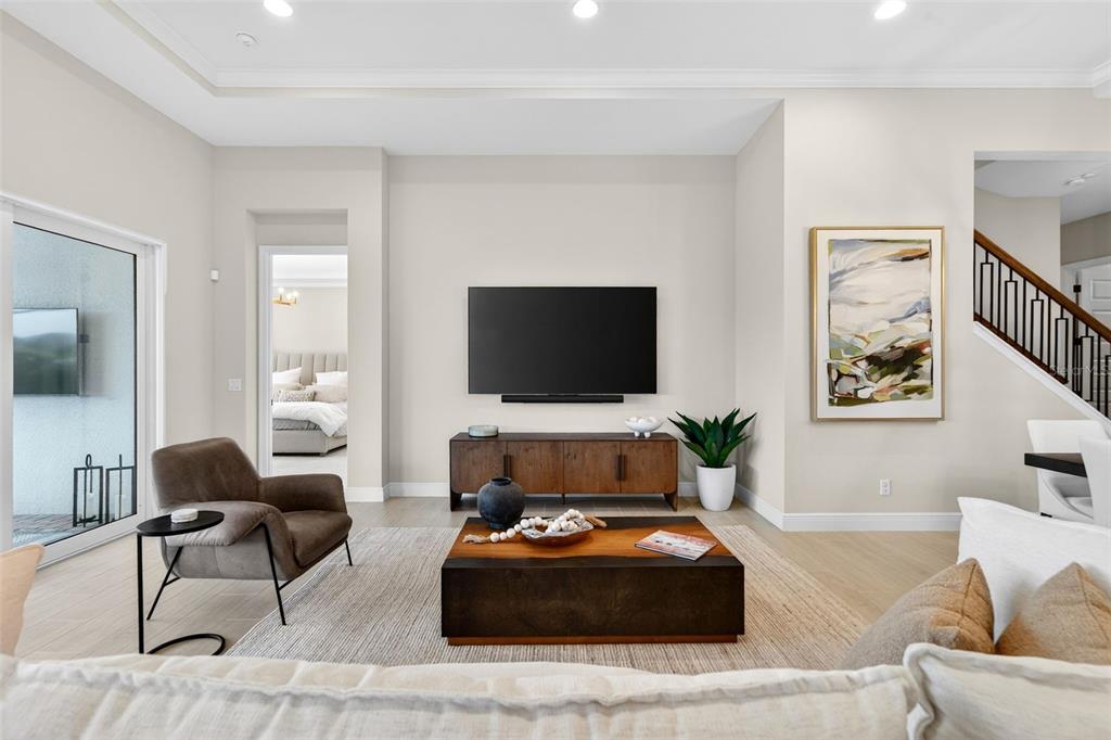 11523 Gleaming Terrace Venice, FL 34293 - Photo 12 of 83 a living room with furniture and a flat screen tv