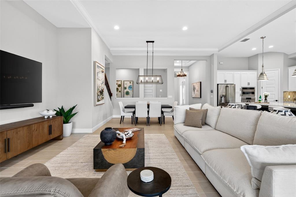 11523 Gleaming Terrace Venice, FL 34293 - Photo 14 of 83 a living room with furniture and a flat screen tv