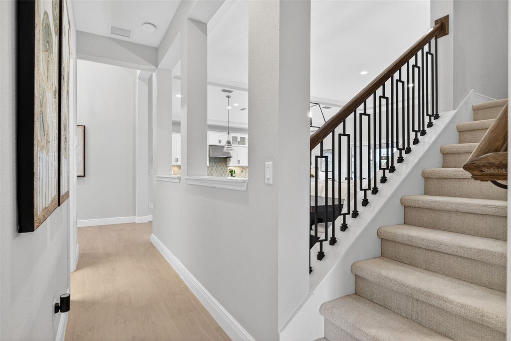 11523 Gleaming Terrace Venice, FL 34293 - Photo 52 of 83 a view of staircase with white walls and windows