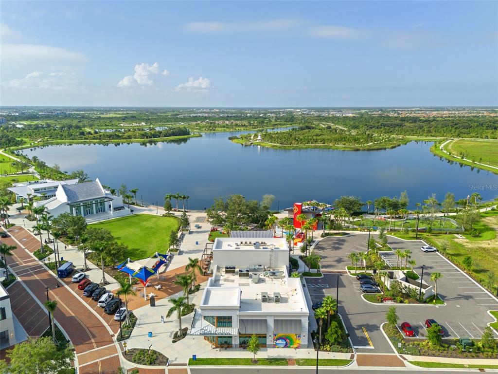 11523 Gleaming Terrace Venice, FL 34293 - Photo 75 of 83 an aerial view of a house with a ocean view